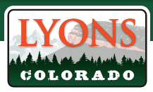Sign for Lyons, Colorado, featuring mountains and trees, with "LYONS" in bold orange and "COLORADO" in white.